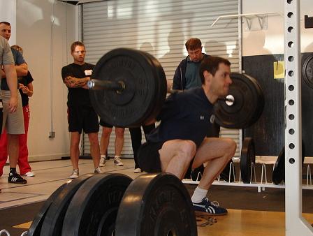 Tom C squatting at the Reno cert